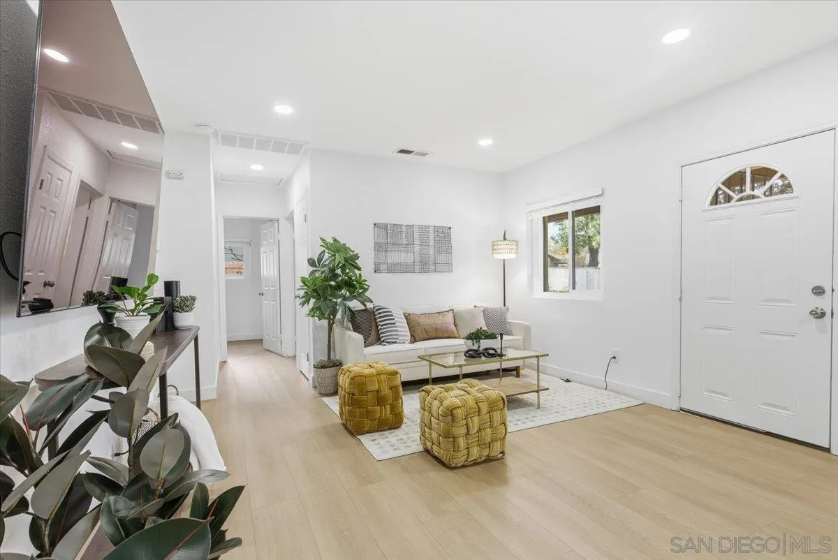 911 Jamacha Road El Cajon, CA 92019 - Photo 7 of 34 a living room with furniture and a potted plant