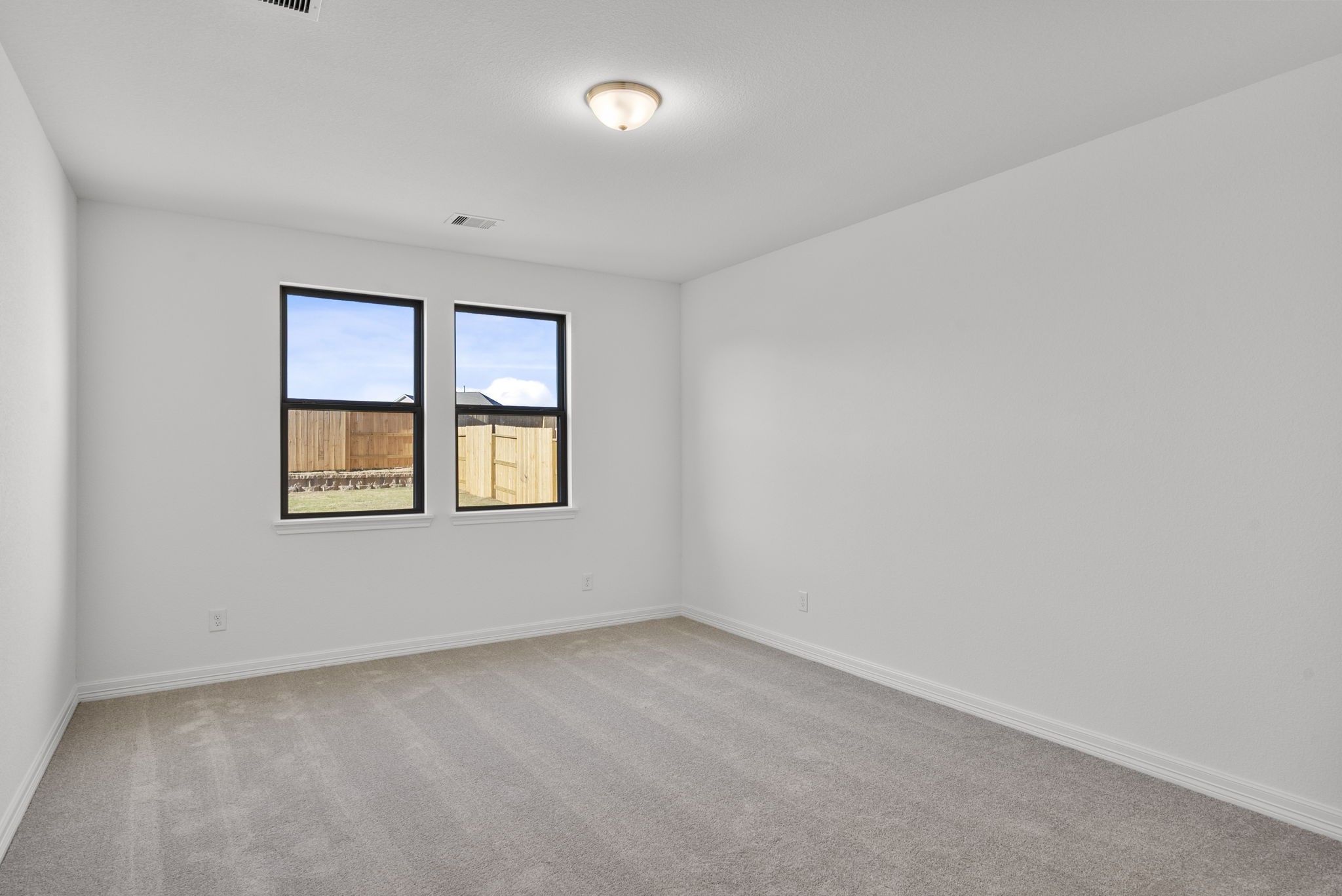 24218 Dewey Trail Magnolia, TX 77355 - Photo 12 of 38 an empty room with a window