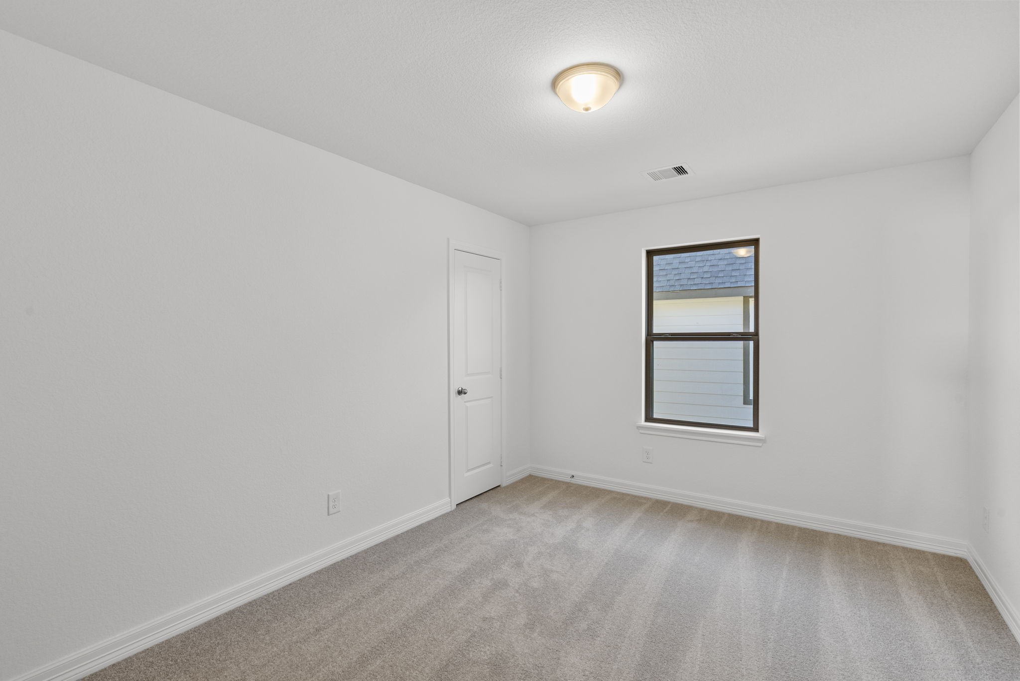24218 Dewey Trail Magnolia, TX 77355 - Photo 21 of 38 an empty room with a window