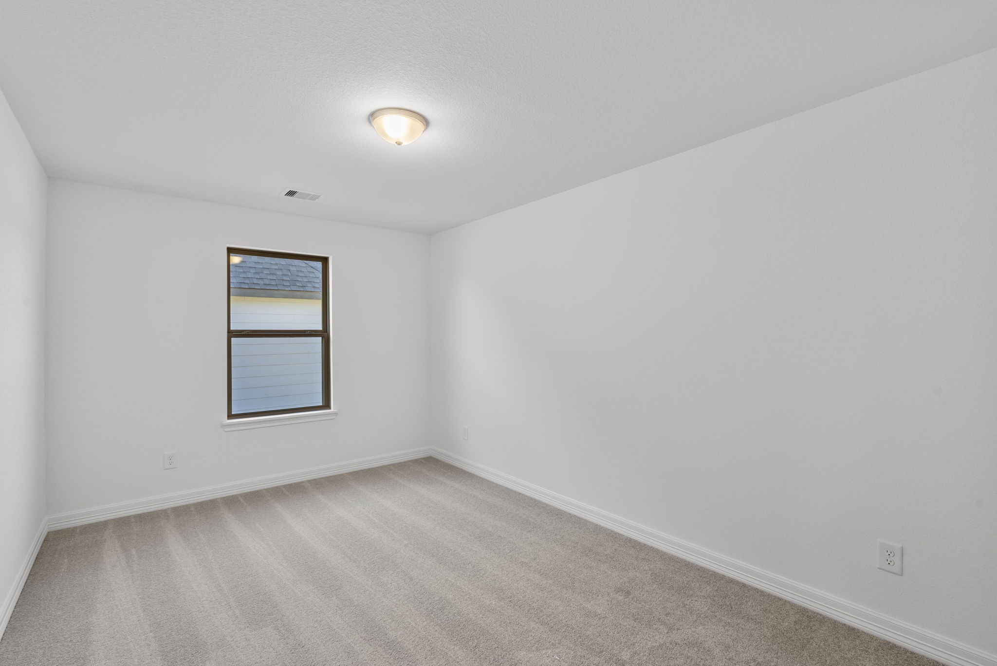 24218 Dewey Trail Magnolia, TX 77355 - Photo 23 of 38 an empty room with a window