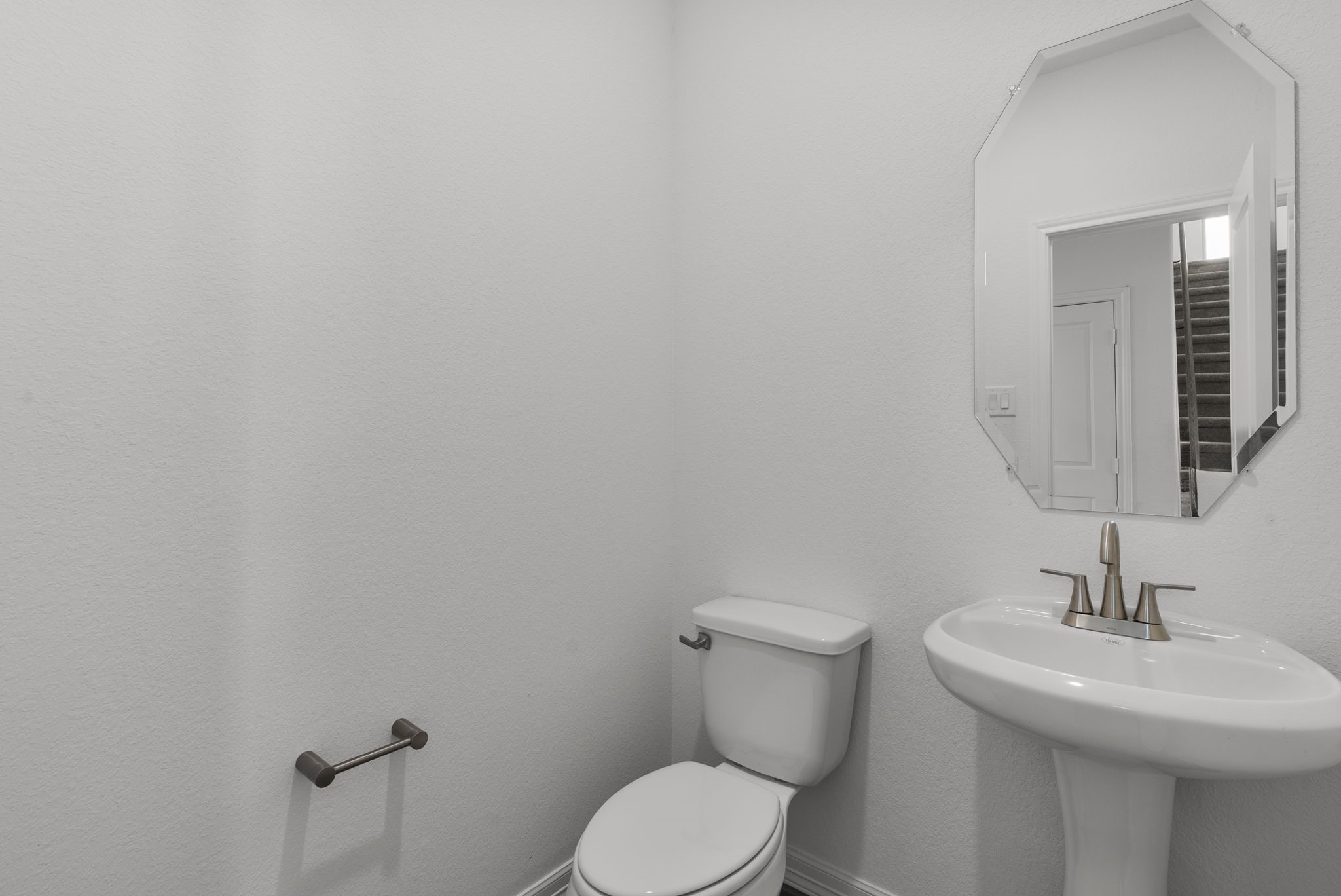 24218 Dewey Trail Magnolia, TX 77355 - Photo 28 of 38 a bathroom with a toilet a sink and mirror