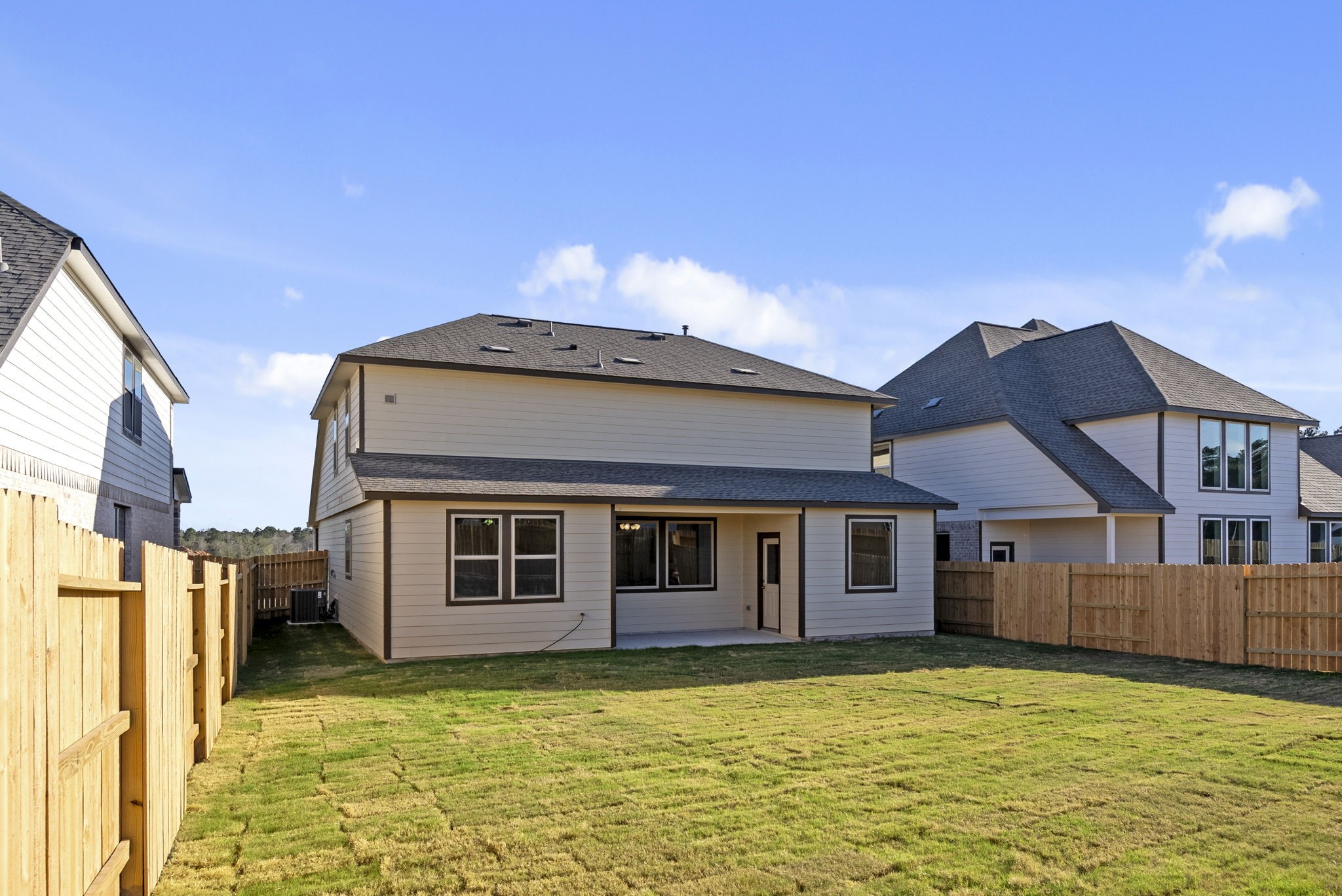 24218 Dewey Trail Magnolia, TX 77355 - Photo 32 of 38 a view of a house with a swimming pool
