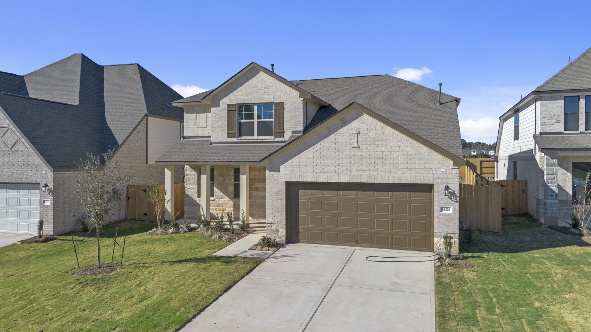 24218 Dewey Trail Magnolia, TX 77355 - Photo 37 of 38 a front view of a house with a yard
