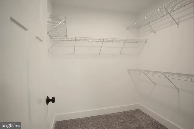 a view of a room with an empty space