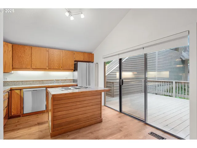 a view of kitchen with wooden floor