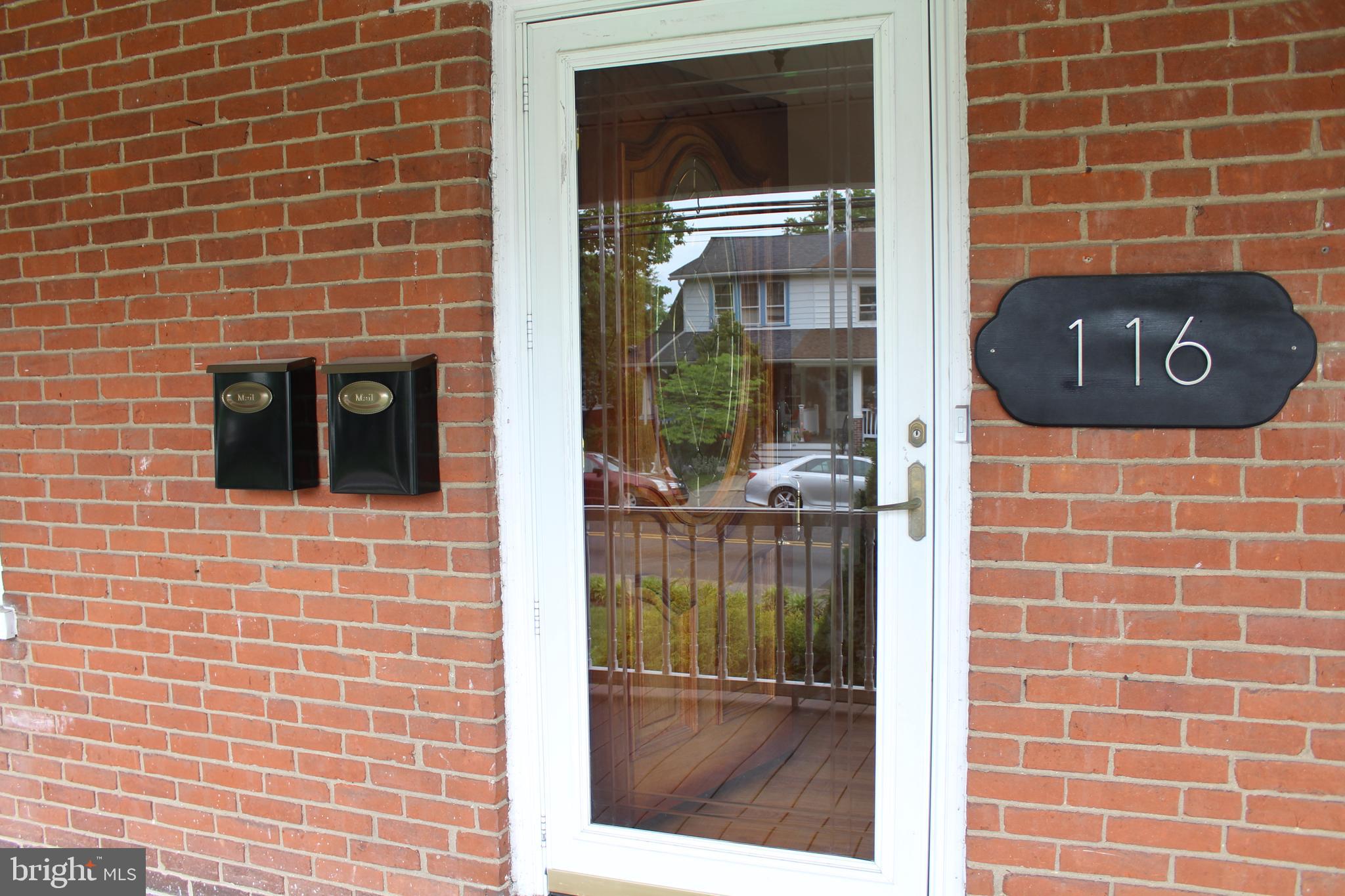 116 South Main Street, Unit 2 Telford, PA 18969 - Photo 23 of 23 a view of a brick wall and a window