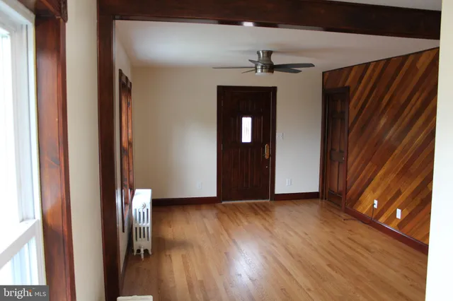 a view of a livingroom with wooden floor