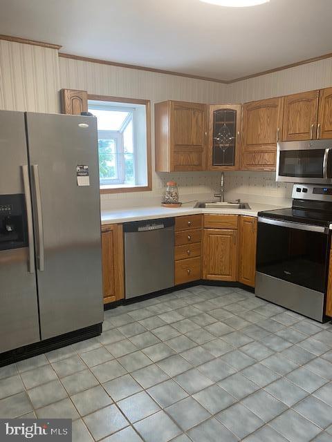 116 South Main Street, Unit 2 Telford, PA 18969 - Photo 8 of 23 a kitchen with stainless steel appliances granite countertop a refrigerator a sink a stove a microwave and island