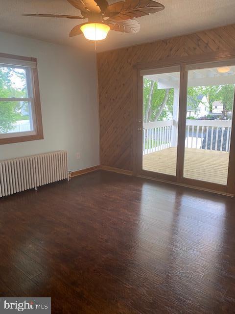 116 South Main Street, Unit 2 Telford, PA 18969 - Photo 10 of 23 an empty room with wooden floor and windows