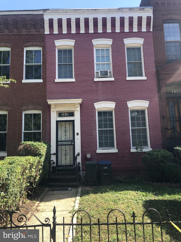 1815 8th Street Northwest Washington, DC 20001 - Photo 1 of 4 a view of a brick building front with many windows