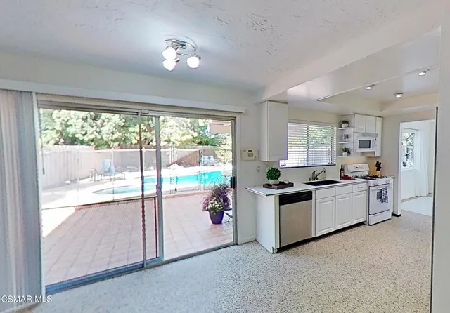 a living room with blue painted walls