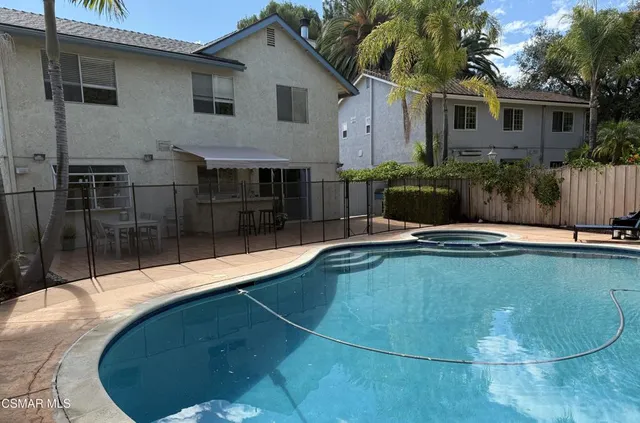 a view of a house with pool