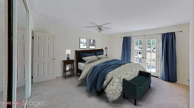 a view of livingroom with furniture and cabinet