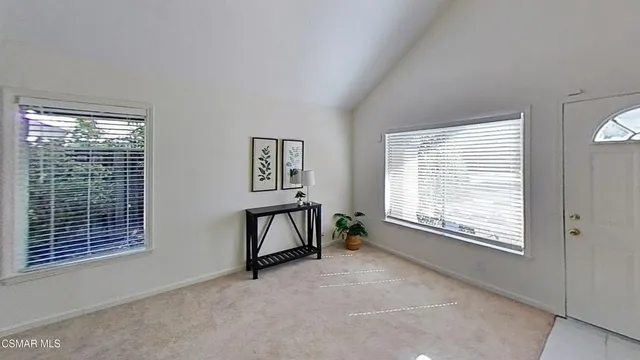 a view of a room with a window