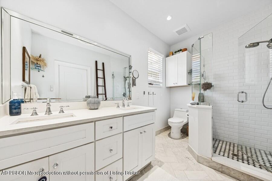 310 Almeria Road West Palm Beach, FL 33405 - Photo 26 of 71 26_310AlmeriaRd_8_Bathroom_Small
