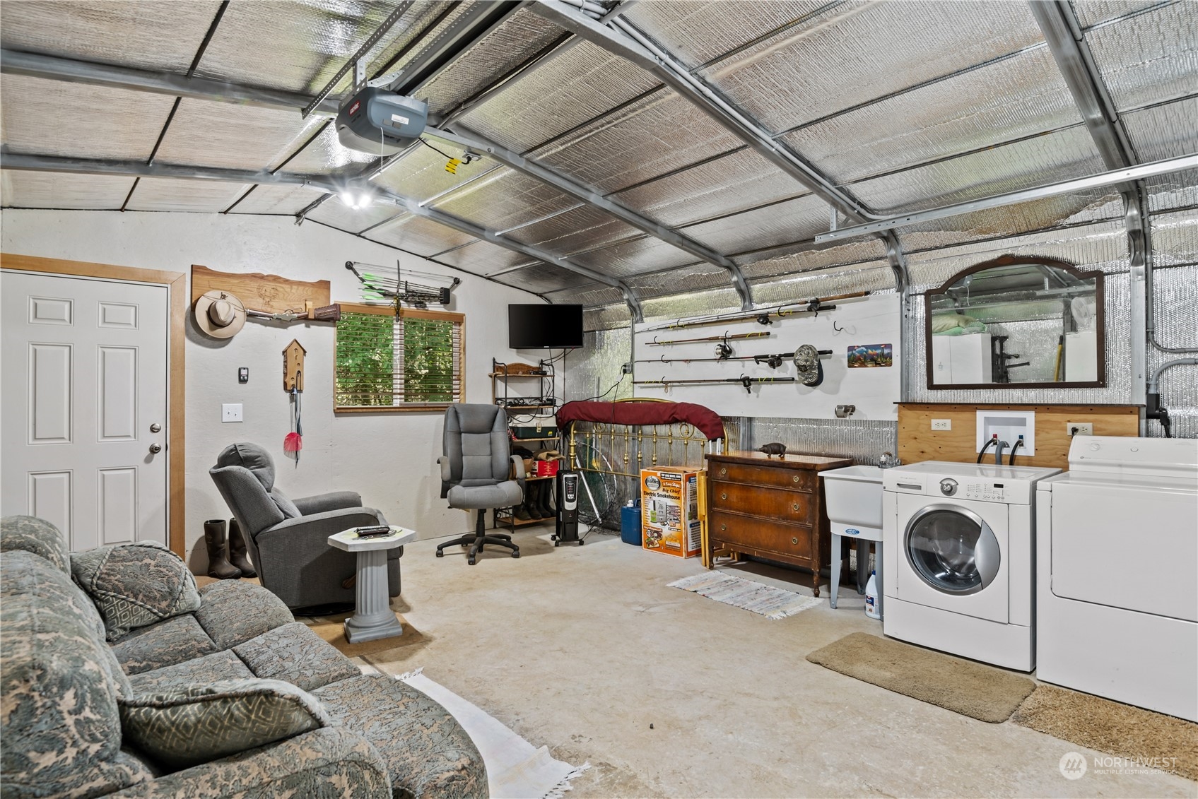296 Cedar Hills Road Longview, WA 98632 - Photo 12 of 27 a view of a storage & utility room with washer and dryer
