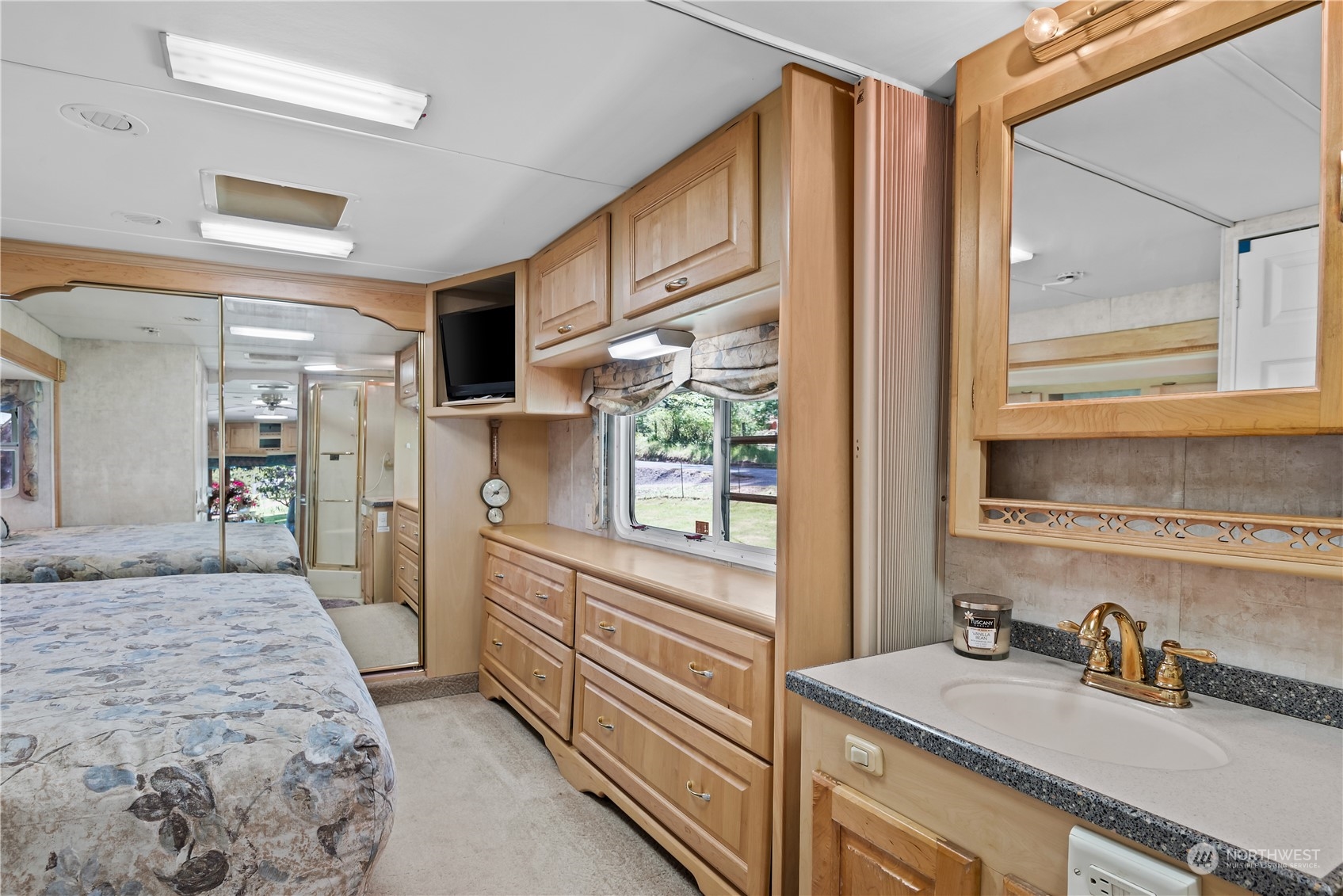 296 Cedar Hills Road Longview, WA 98632 - Photo 16 of 27 a kitchen with a sink stove and refrigerator