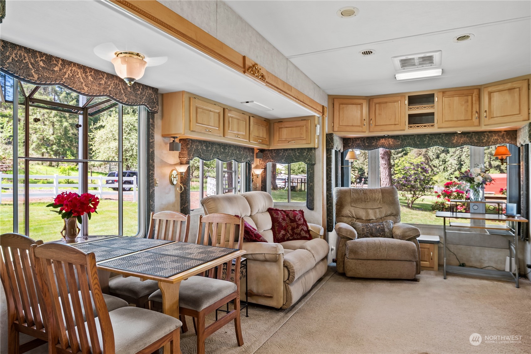 296 Cedar Hills Road Longview, WA 98632 - Photo 20 of 27 a living room with furniture and a floor to ceiling window