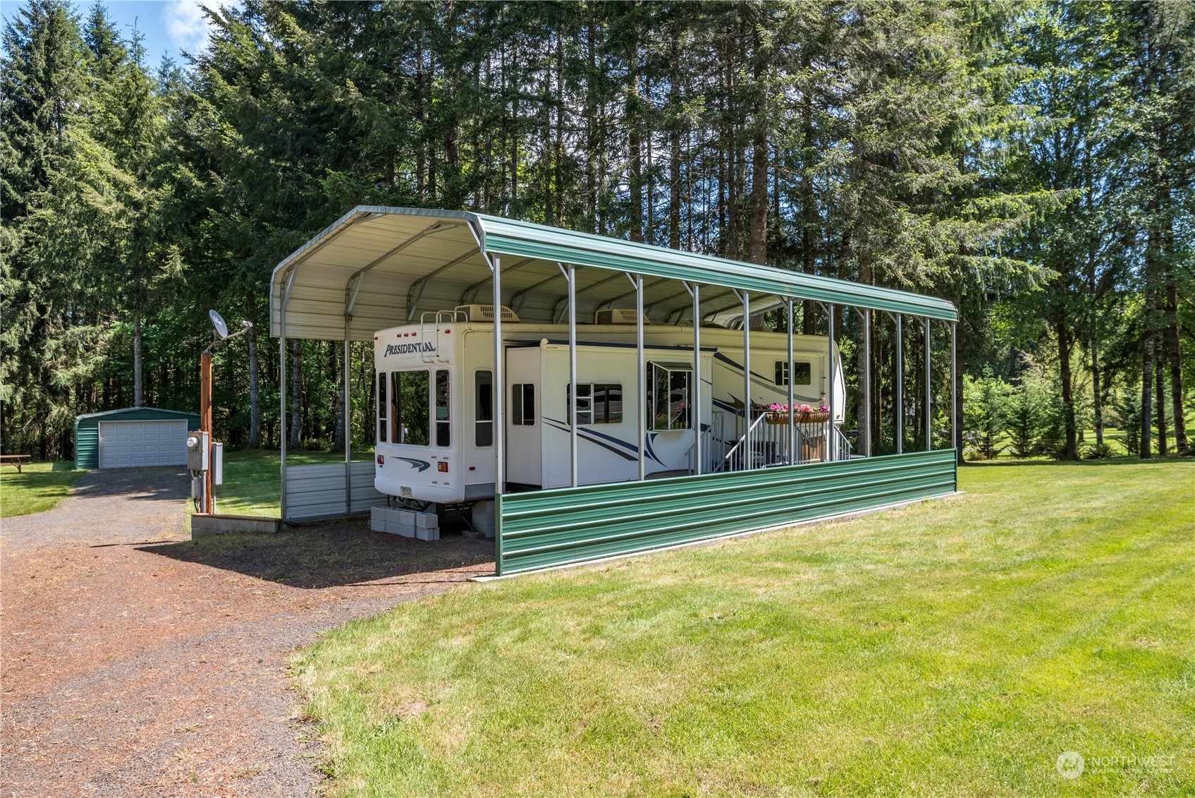 296 Cedar Hills Road Longview, WA 98632 - Photo 3 of 27 a front view of a house with a yard table and chairs