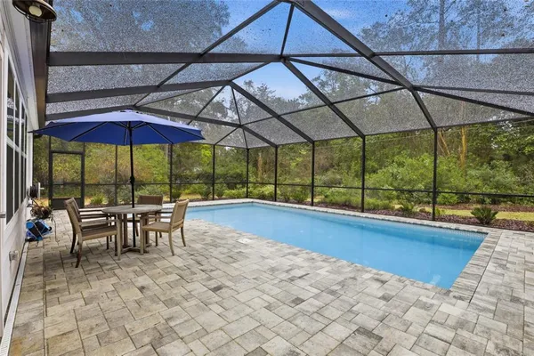 a view of outdoor space with swimming pool