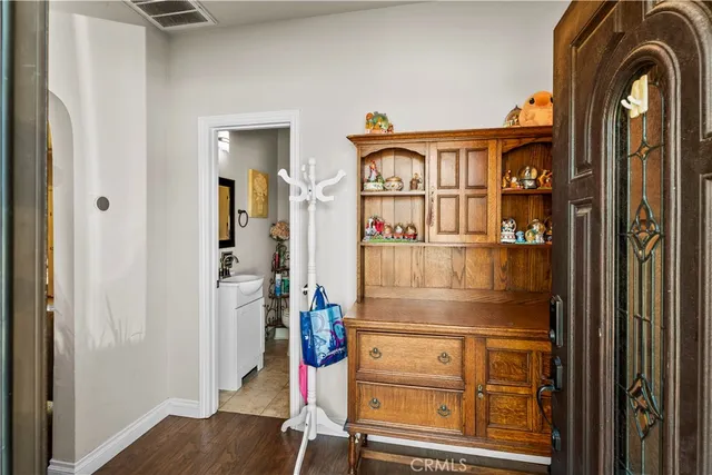 a view of front door and bedroom