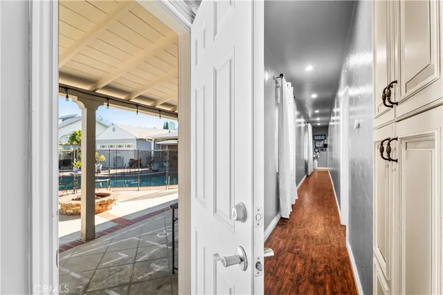 a view of a glass door and a window