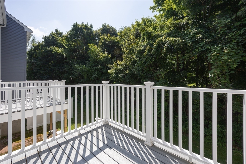 19 Cedar Square, Unit 19 Millis, MA 02054 - Photo 35 of 42 a view of a wooden fence