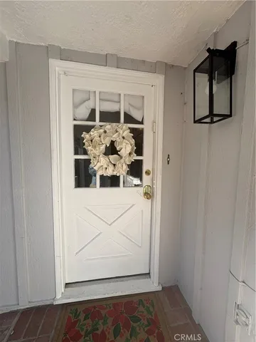 a view of a livingroom with wooden floor