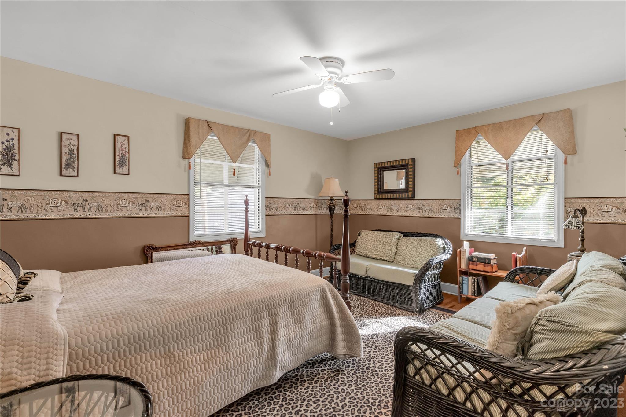 401 Gillsbrook Road Lancaster, SC 29720 - Photo 14 of 27 a bedroom with a large bed and a couch