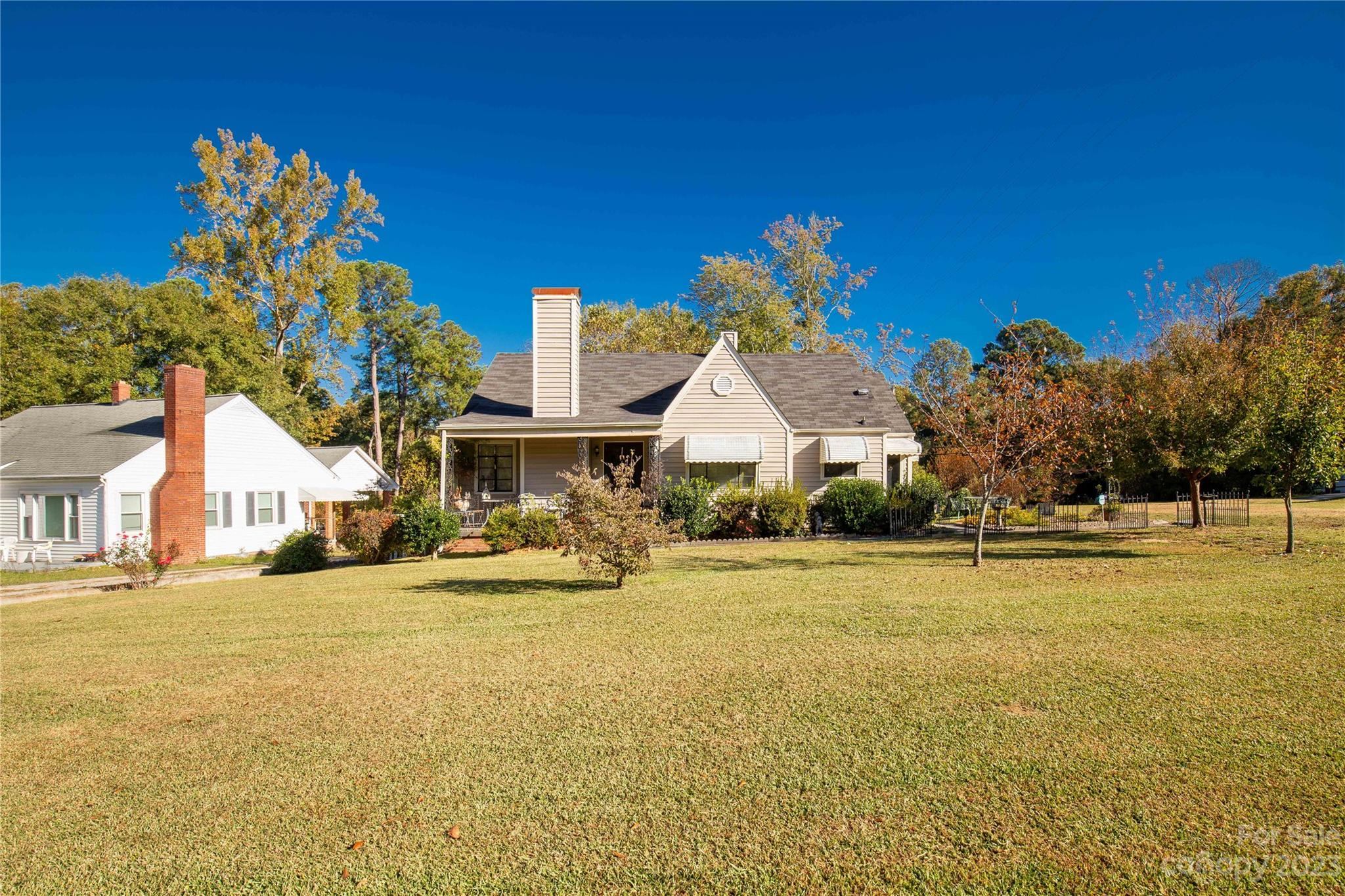 401 Gillsbrook Road Lancaster, SC 29720 - Photo 2 of 27 a front view of a house with a yard and fountain