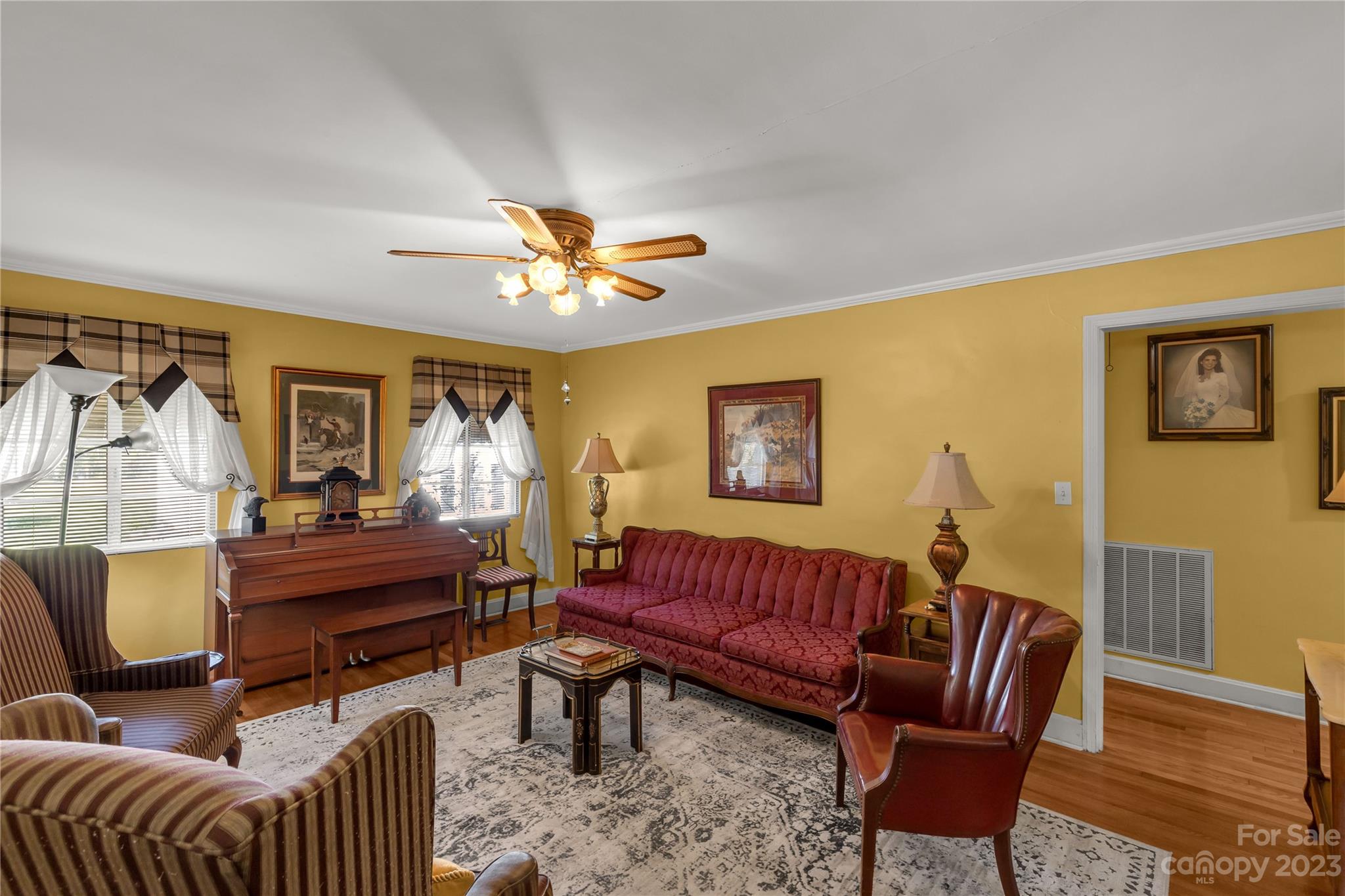401 Gillsbrook Road Lancaster, SC 29720 - Photo 5 of 27 a living room with furniture and a chandelier