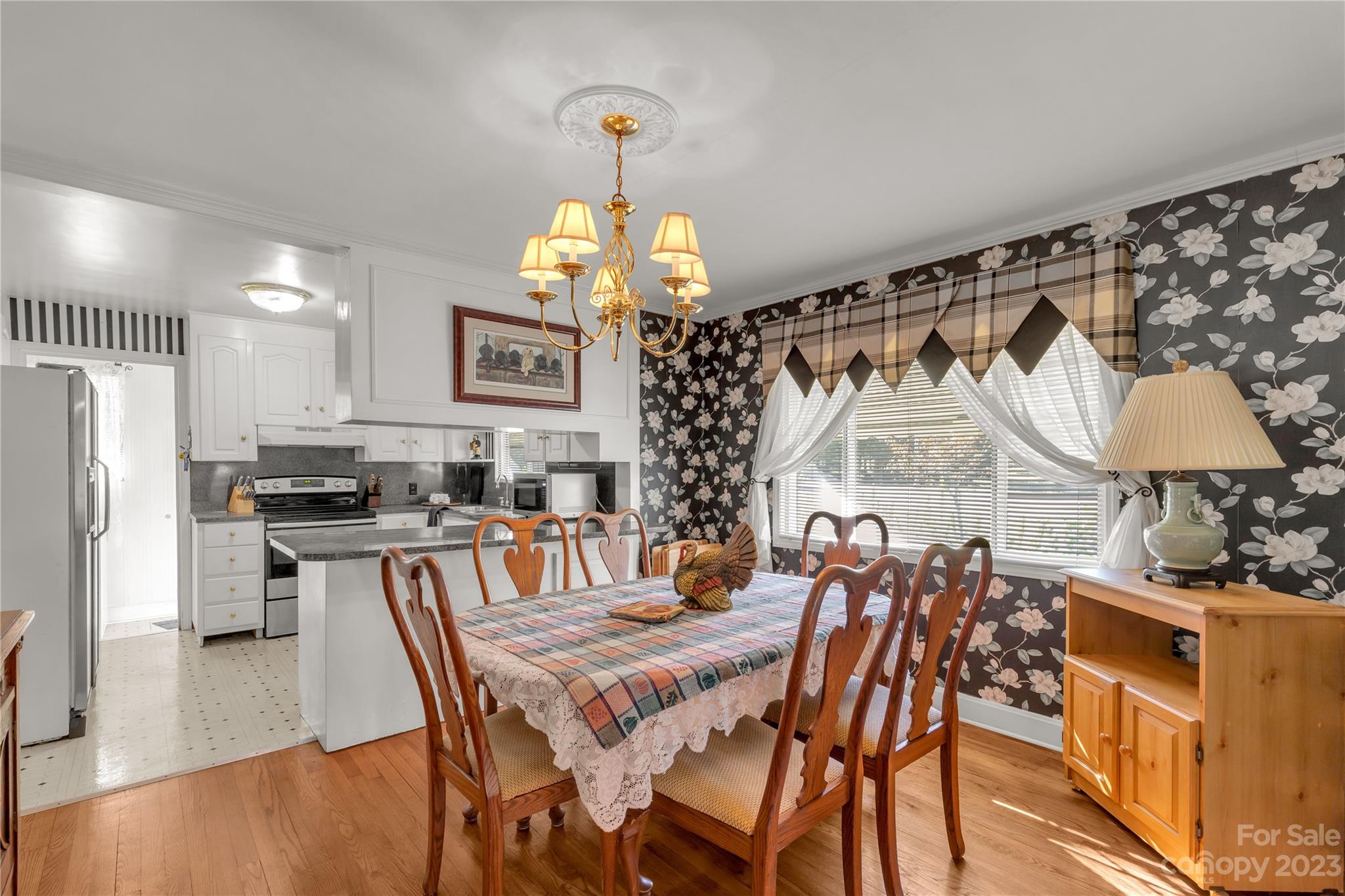 401 Gillsbrook Road Lancaster, SC 29720 - Photo 8 of 27 a view of a dining room with furniture window and wooden floor