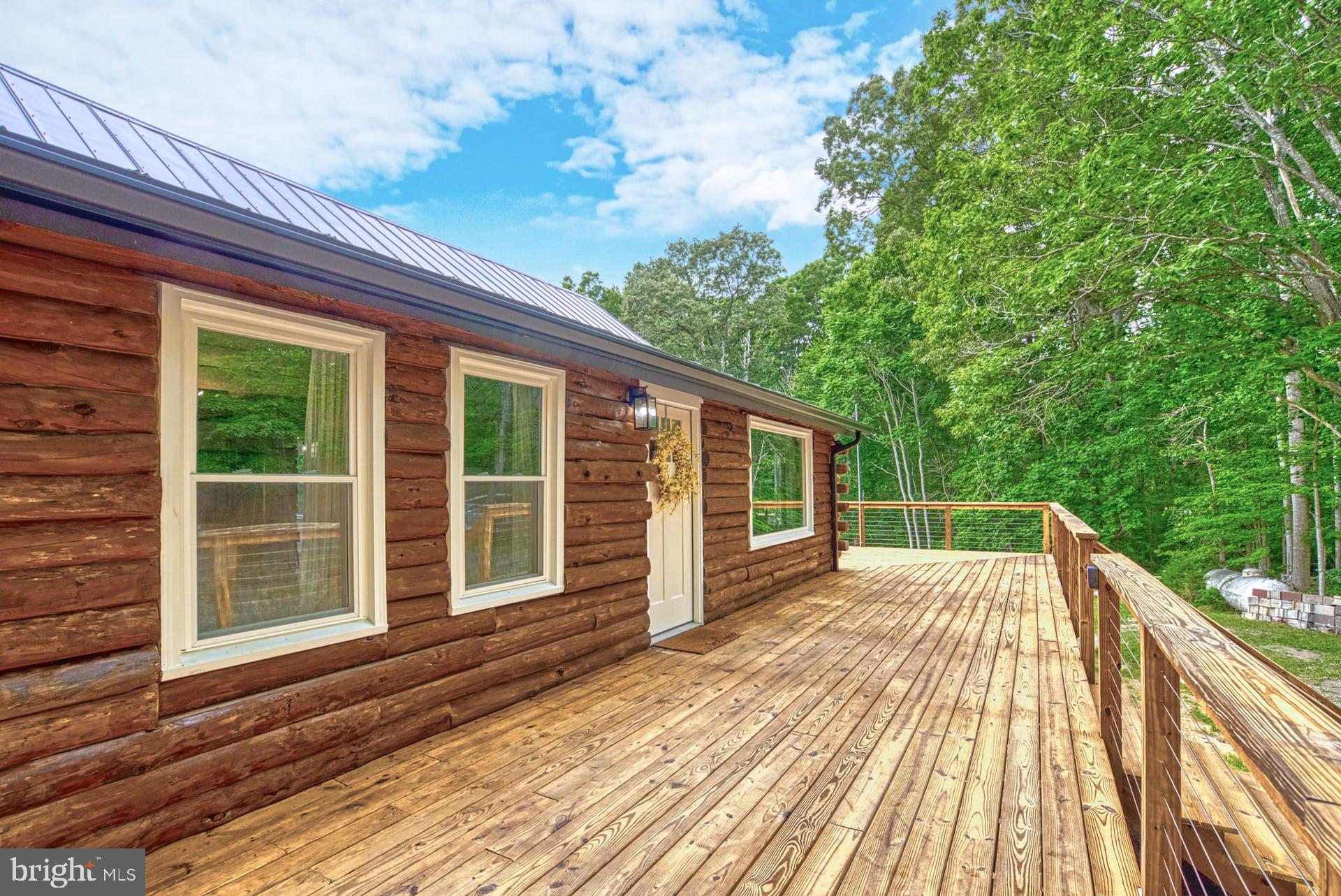 14422 Crawleys Dam Road Goldvein, VA 22720 - Photo 19 of 41 a view of deck with patio