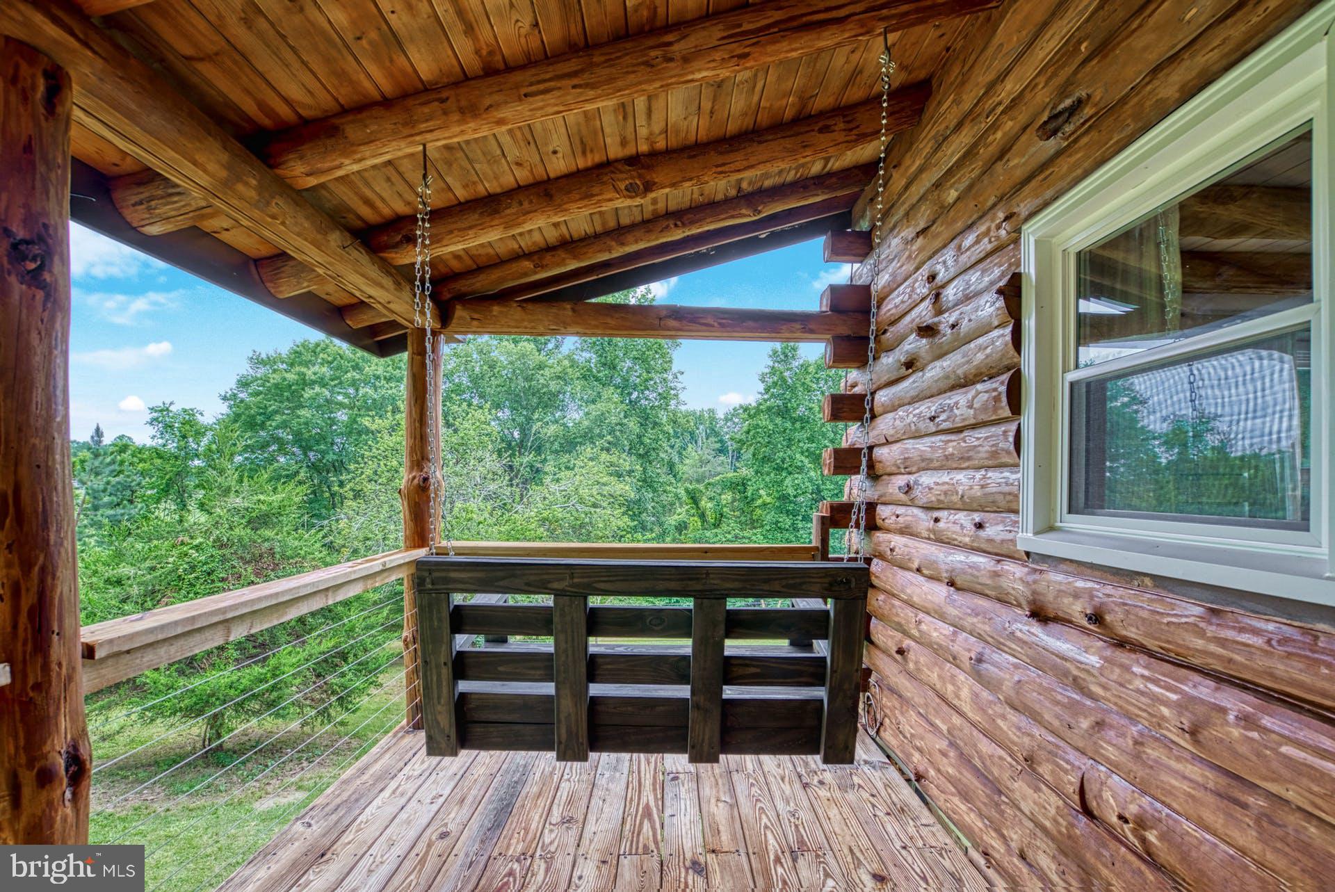 14422 Crawleys Dam Road Goldvein, VA 22720 - Photo 31 of 41 a view of deck with wooden floor and outdoor space