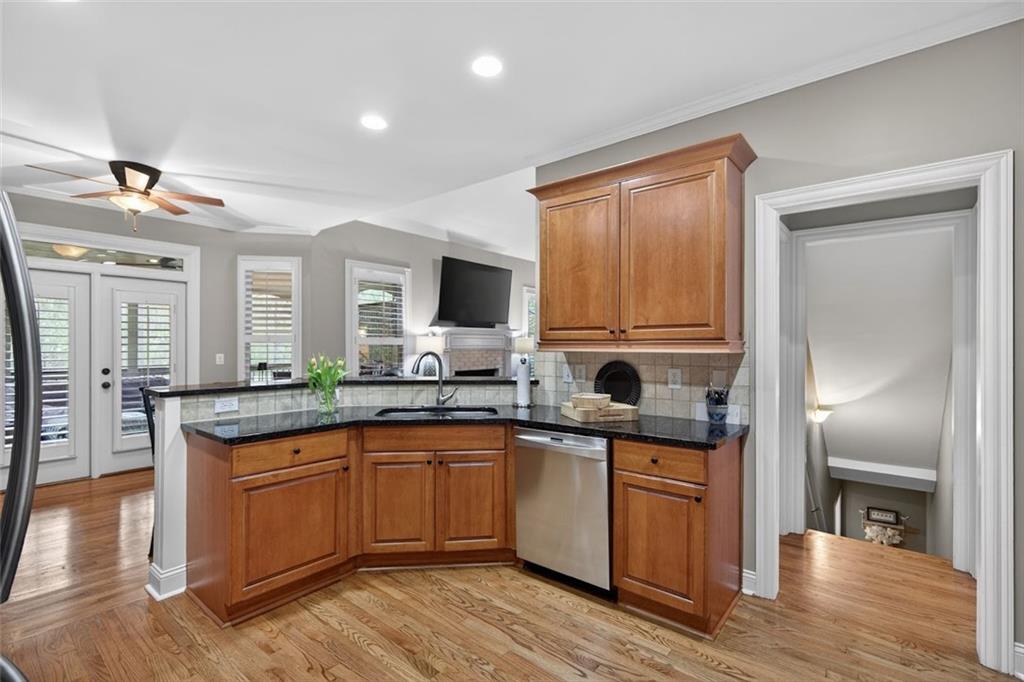 129 Dorchester Way Villa Rica, GA 30180 - Photo 11 of 65 a kitchen with a sink window and cabinets