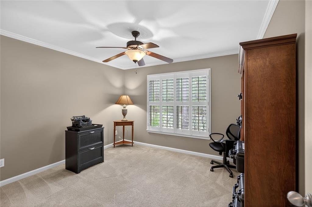 129 Dorchester Way Villa Rica, GA 30180 - Photo 28 of 65 a bedroom with a workspace