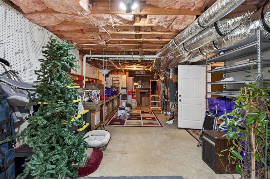 129 Dorchester Way Villa Rica, GA 30180 - Photo 43 of 65 a view of a room with gym equipment