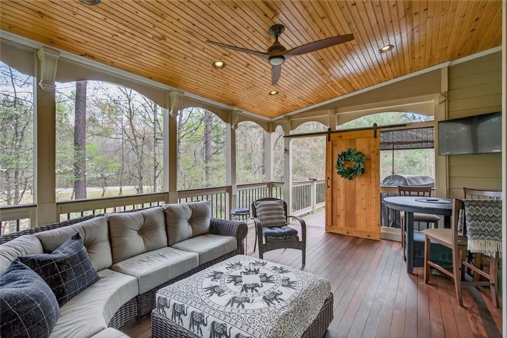129 Dorchester Way Villa Rica, GA 30180 - Photo 45 of 65 a living room with furniture and wooden floor