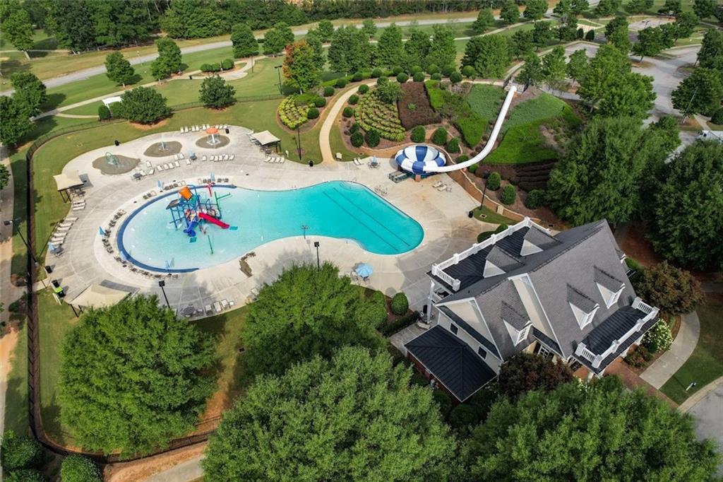129 Dorchester Way Villa Rica, GA 30180 - Photo 55 of 65 an aerial view of a house with outdoor space and a lake view