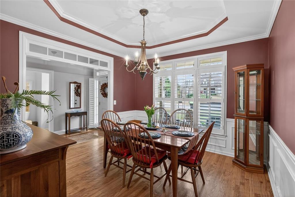 129 Dorchester Way Villa Rica, GA 30180 - Photo 6 of 65 a view of a dining room with furniture window and wooden floor