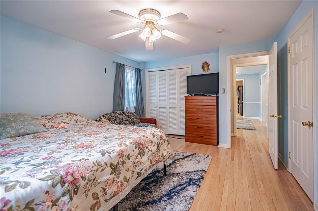 285 Bridle Path Road Bethlehem, PA 18017 - Photo 25 of 54 a bedroom with a bed and a chandelier