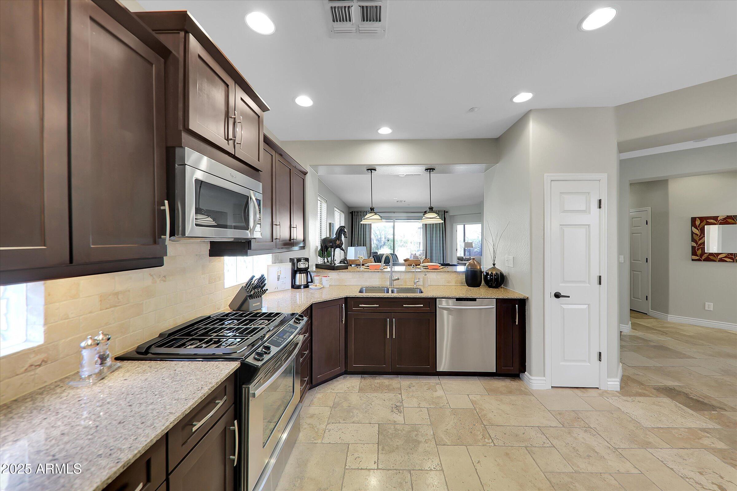 41532 North Clear Crossing Road Anthem, AZ 85086 - Photo 13 of 57 Open to the great room