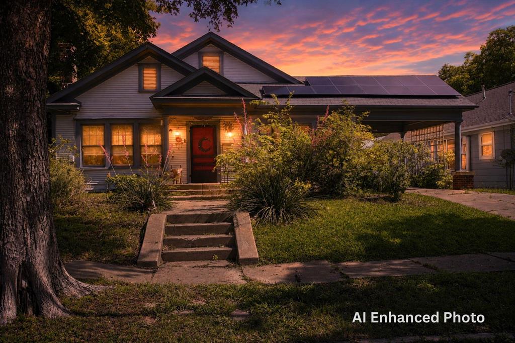 1500 Bonham Street Commerce, TX 75428 - Photo 1 of 29 a front view of a house with garden