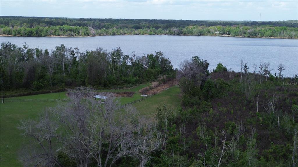 16865 Southeast 27th Place Road Ocklawaha, FL 32179 - Photo 9 of 12 a view of lake and mountain view
