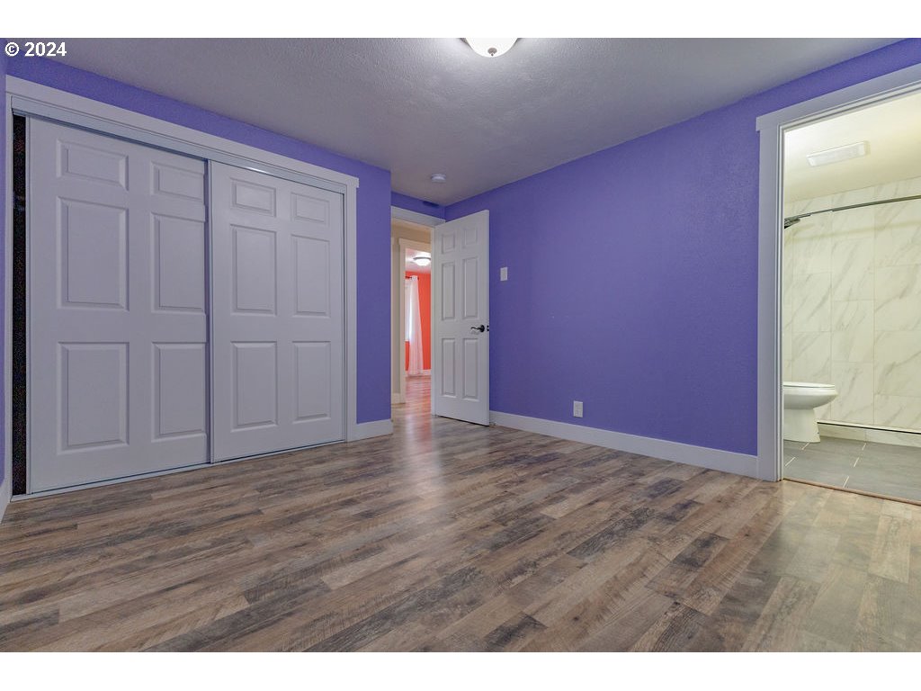 2102 Delta Street Eugene, OR 97404 - Photo 20 of 35 a view of an empty room with wooden floor