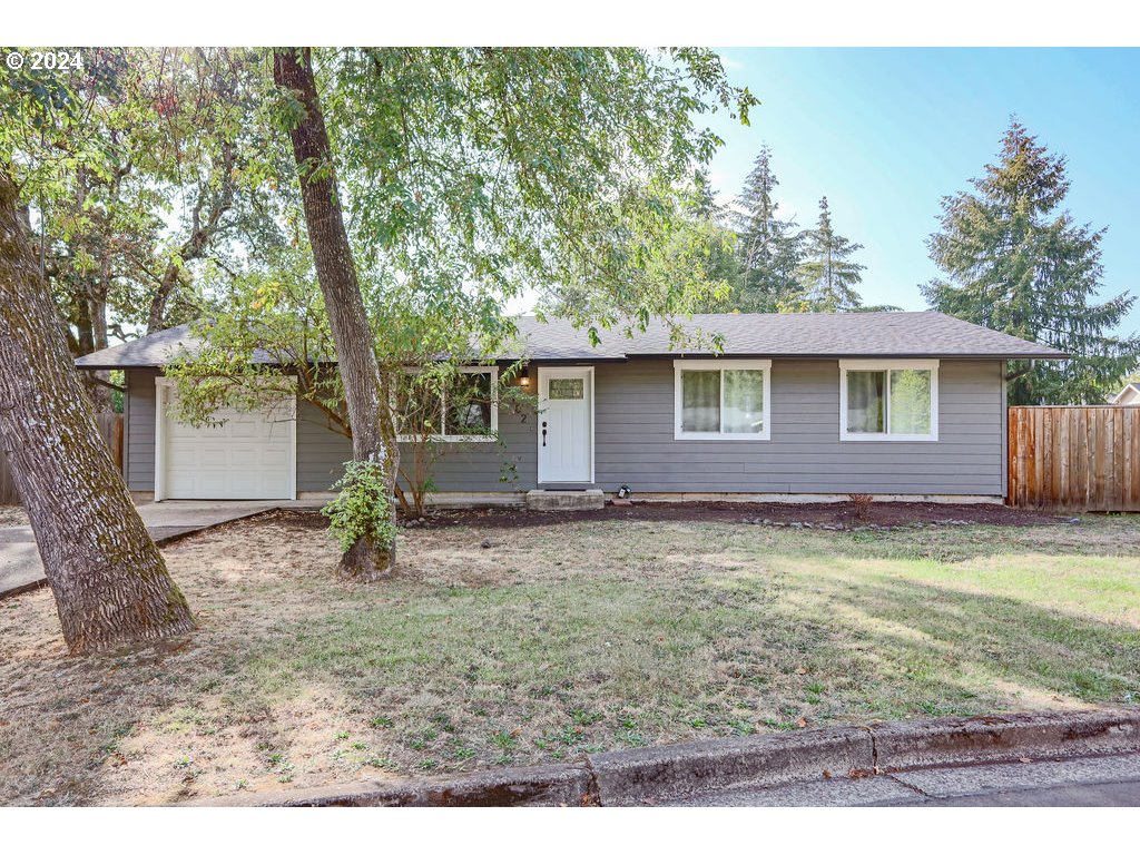 2102 Delta Street Eugene, OR 97404 - Photo 2 of 35 a backyard of a house with seating space