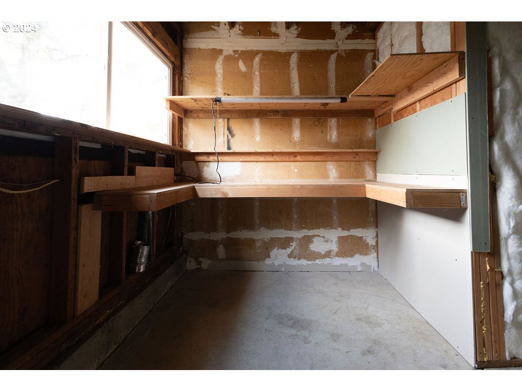 2102 Delta Street Eugene, OR 97404 - Photo 25 of 35 a living room with a wooden floor