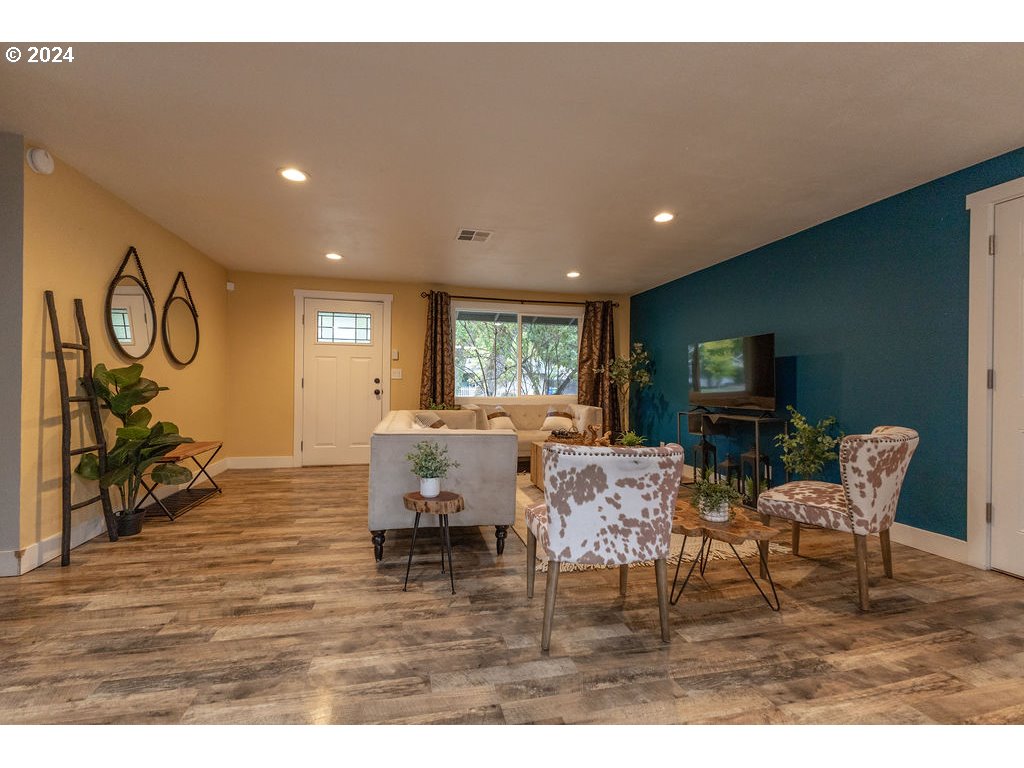 2102 Delta Street Eugene, OR 97404 - Photo 32 of 35 a living room with furniture and wooden floor