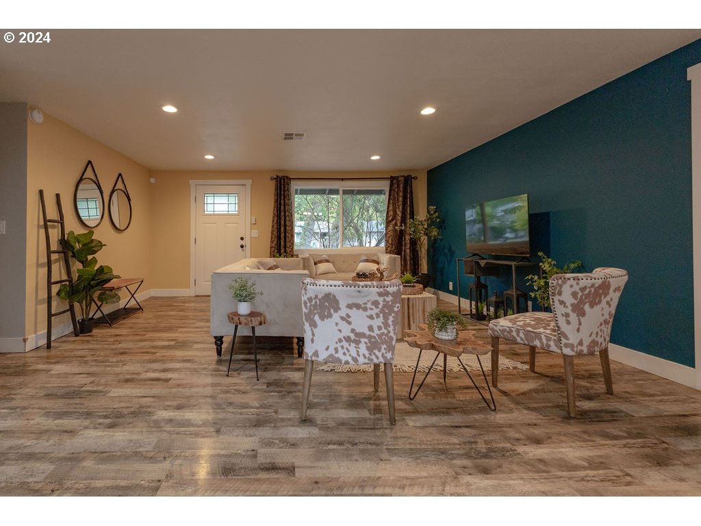 2102 Delta Street Eugene, OR 97404 - Photo 33 of 35 a living room with furniture and a flat screen tv