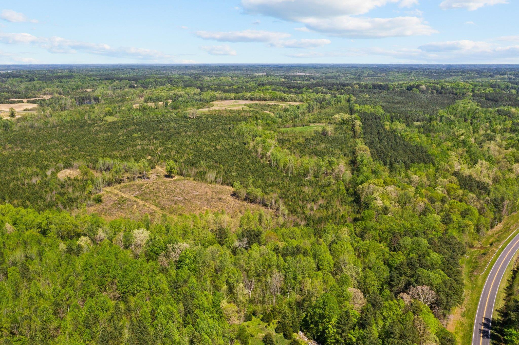 0 Salem Road Oxford, NC 27565 - Photo 21 of 42 an aerial view of residential houses with outdoor space and trees